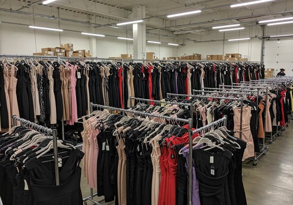 A warehouse filled with a variety of bandage dresses in France